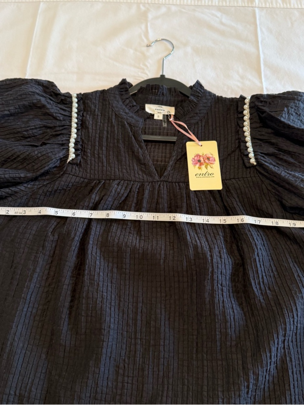 Feminine flowy top from Entro.  Black Ruffle Sleeve Blouse with Pearl Trim - Picture 7 of 14